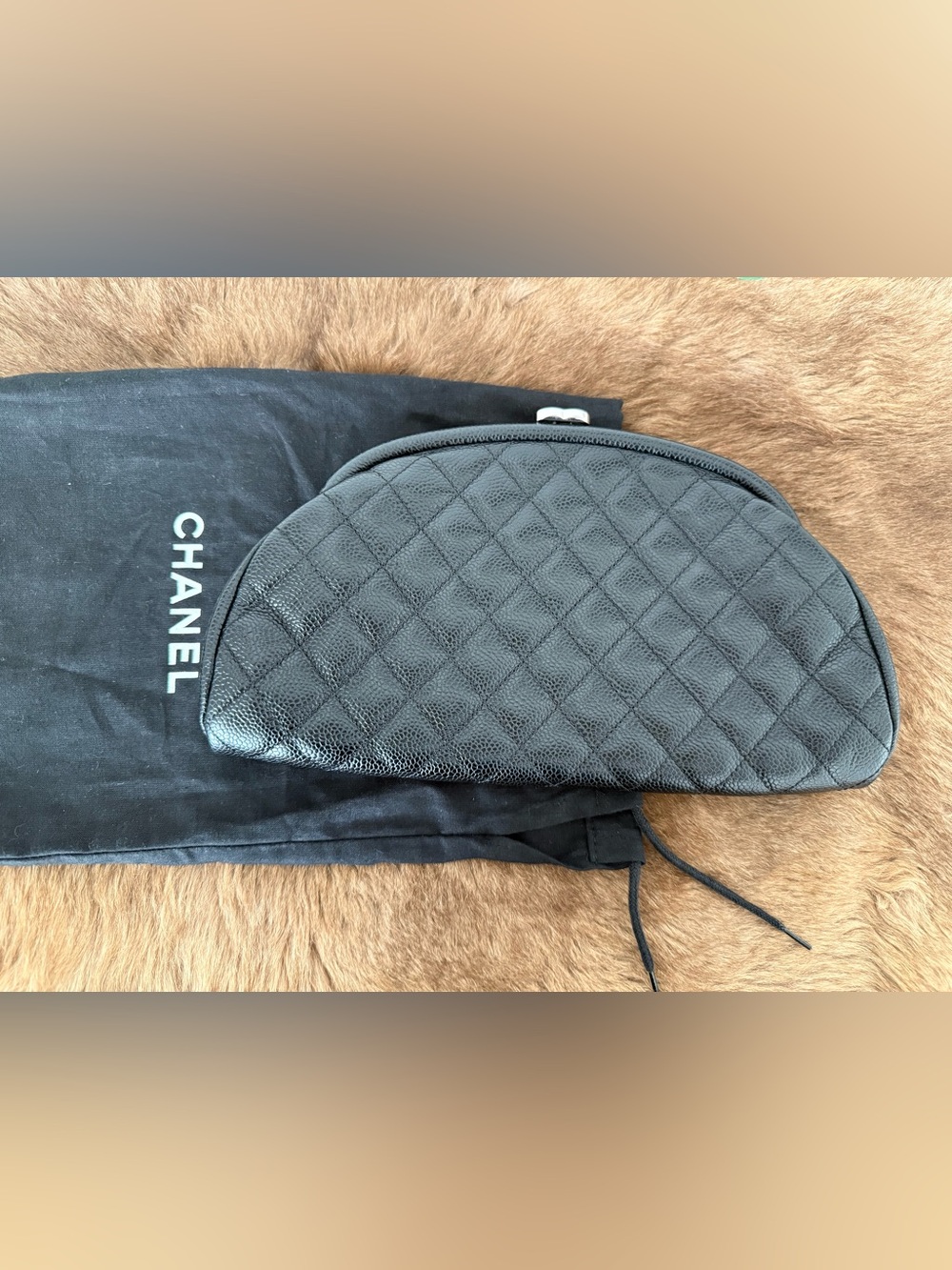 Authentic pre-owned CHANEL Black Quilted Caviar Leather clutch bag